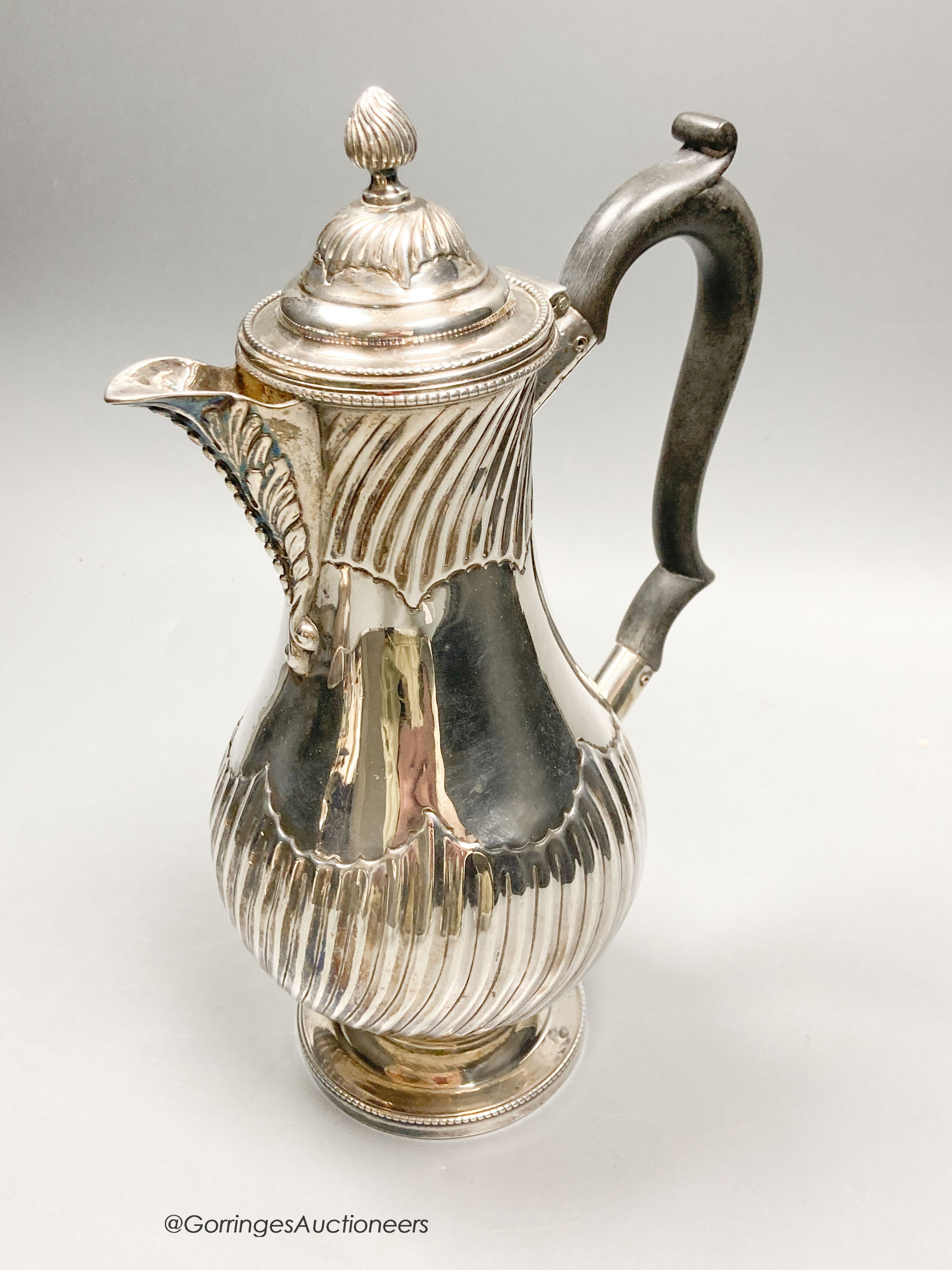 A late Victorian demi wrythened fluted baluster hot water pot, Martin, Hall & Co, Sheffield, 1893, height 22.8cm